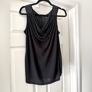 Dressy sleeveless tank with gold adornment and sequins at shoulder